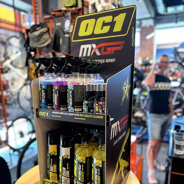 OC1 MXGP display stand with products in a shop